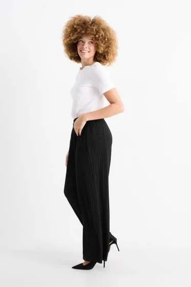 Plissé trousers - high-rise waist - wide leg