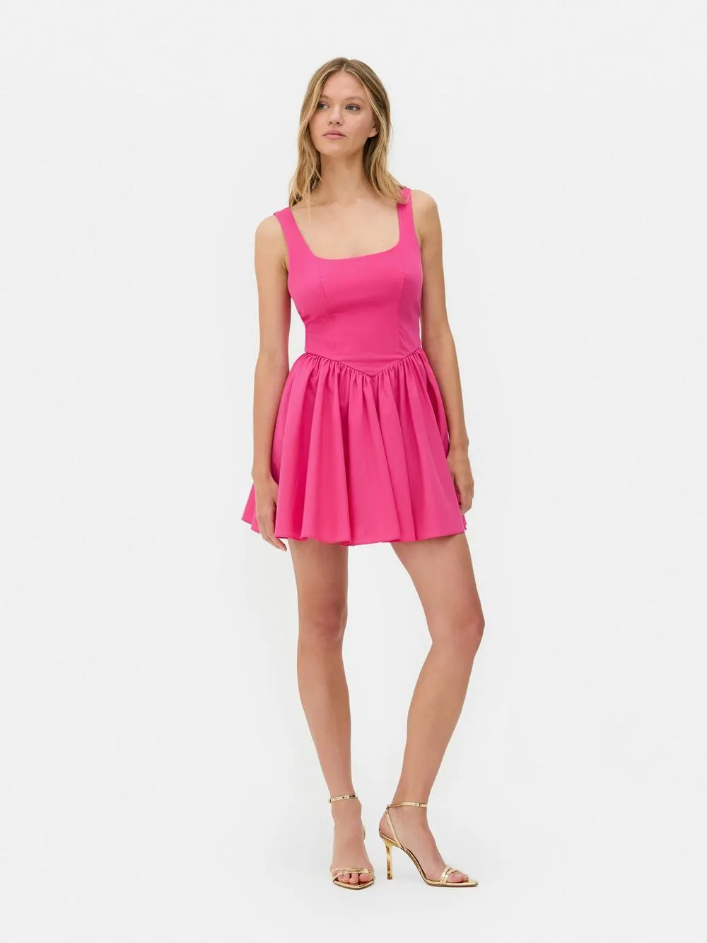 Miniabito smanicato a corsetto