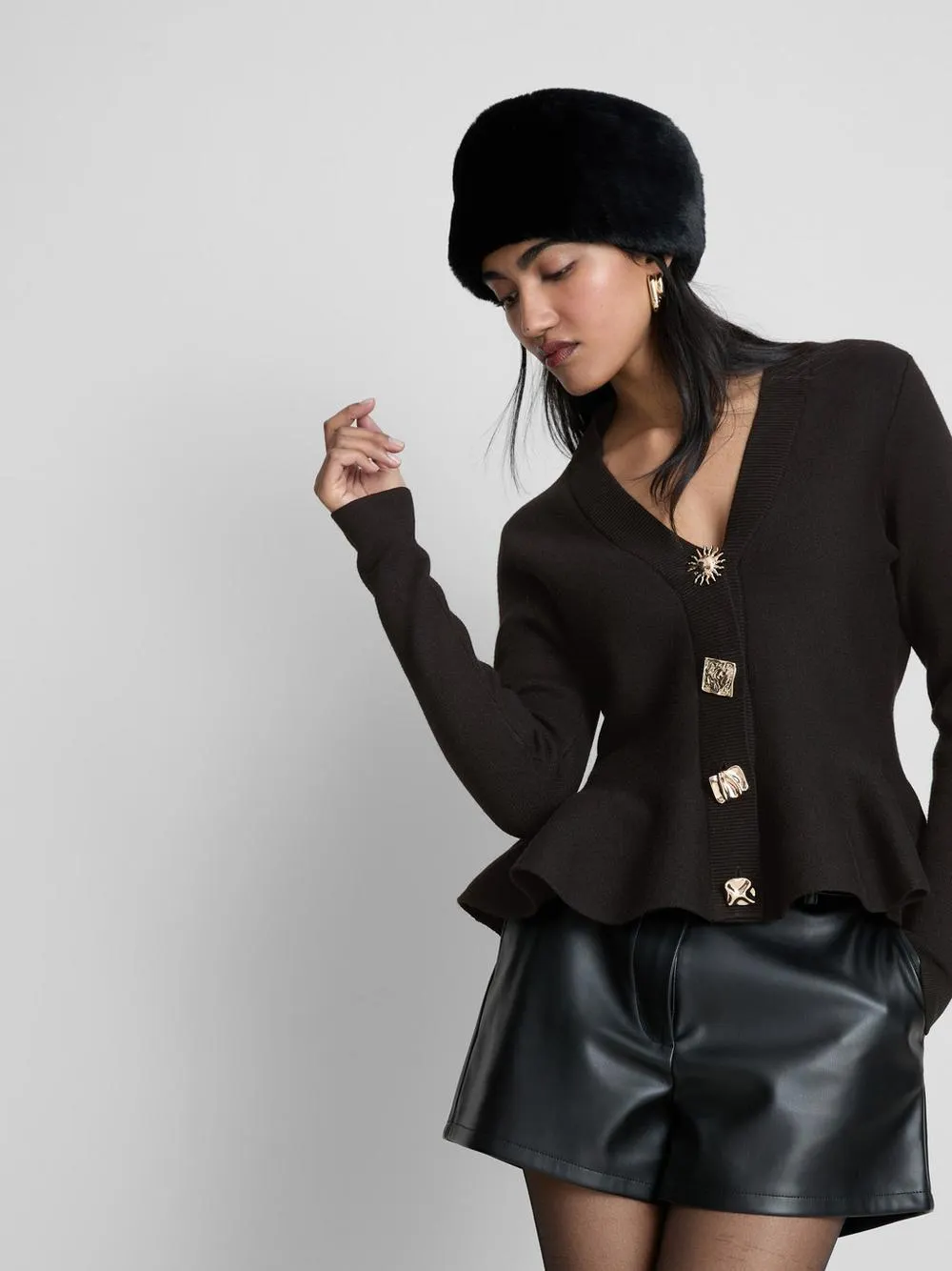 Gilet à basques et col en V