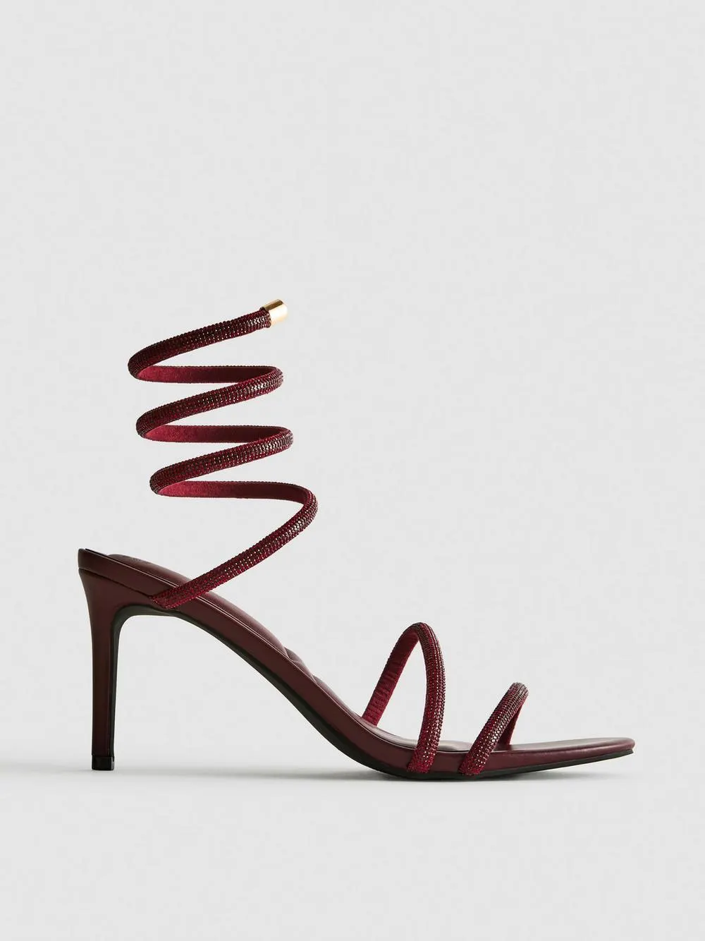 Sandaletten mit Spiralriemen und Strasssteinen