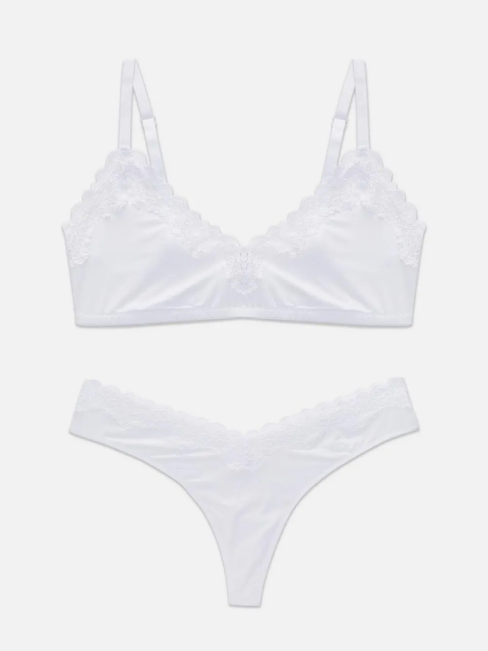 Ungepolsterter BH und Tanga mit Spitzenbesatz