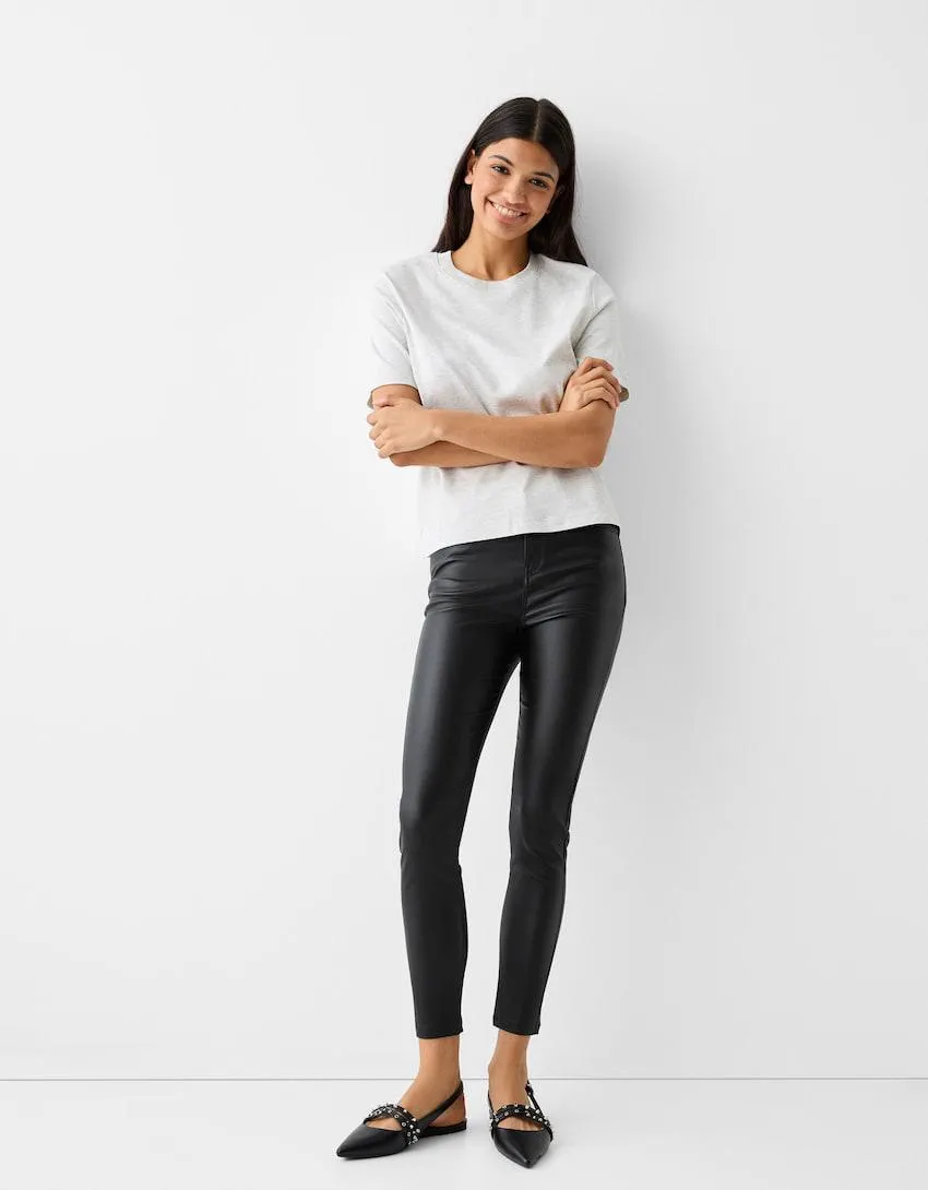 Coated skinny trousers