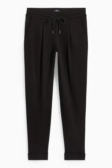 Jersey trousers - mid-rise waist - tapered fit