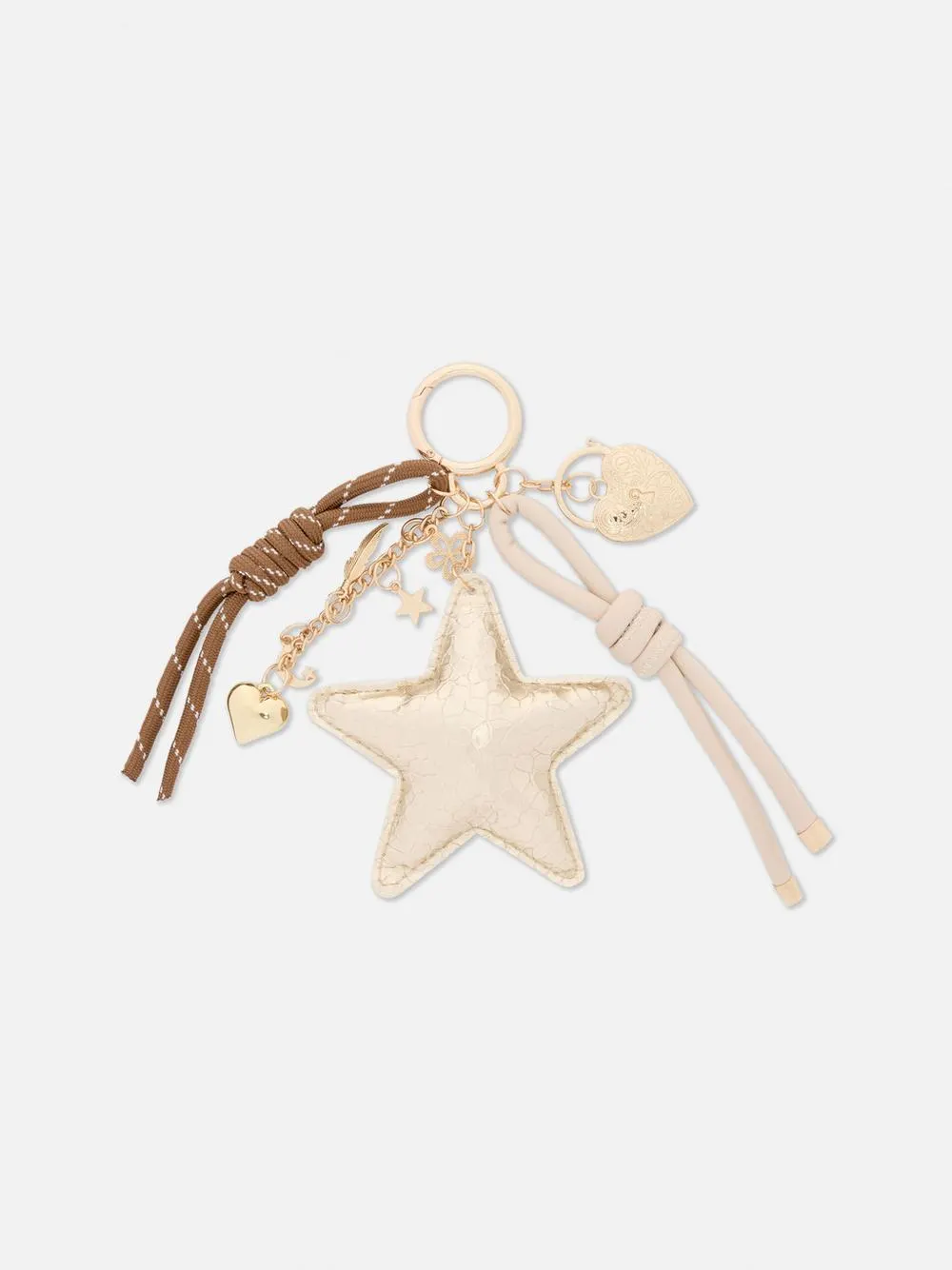 Goldfarbener Schlüsselanhänger mit Kordel und Sternanhänger