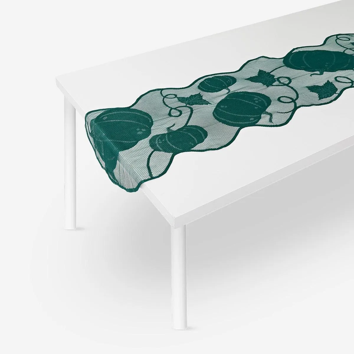 Green table runner with pumpkin print