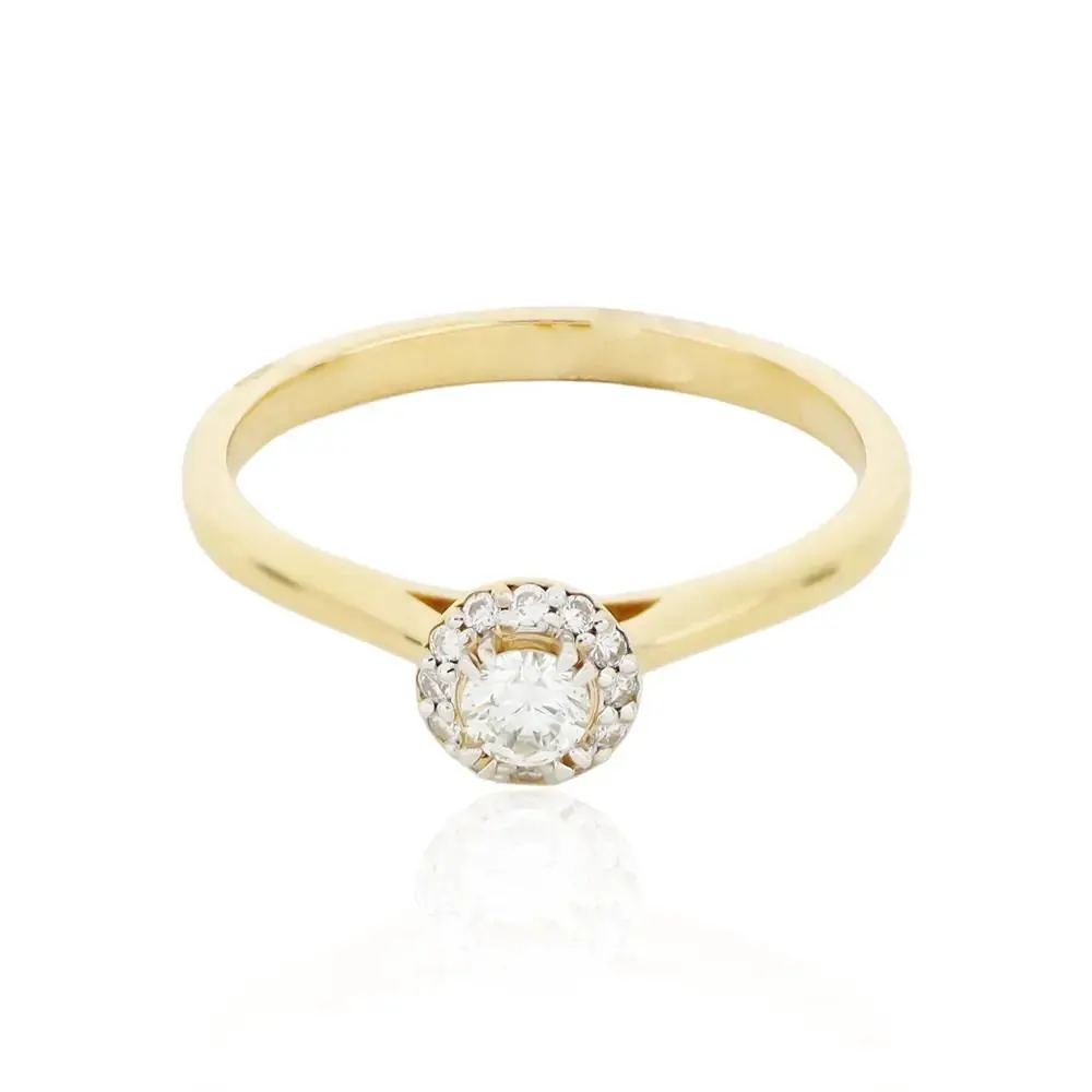 ANILLO DE COMPROMISO REDONDO ENMARCADO DE DIAMANTES