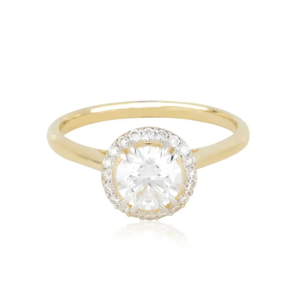 ANILLO DE COMPROMISO REDONDO ENMARCADO DE DIAMANTES