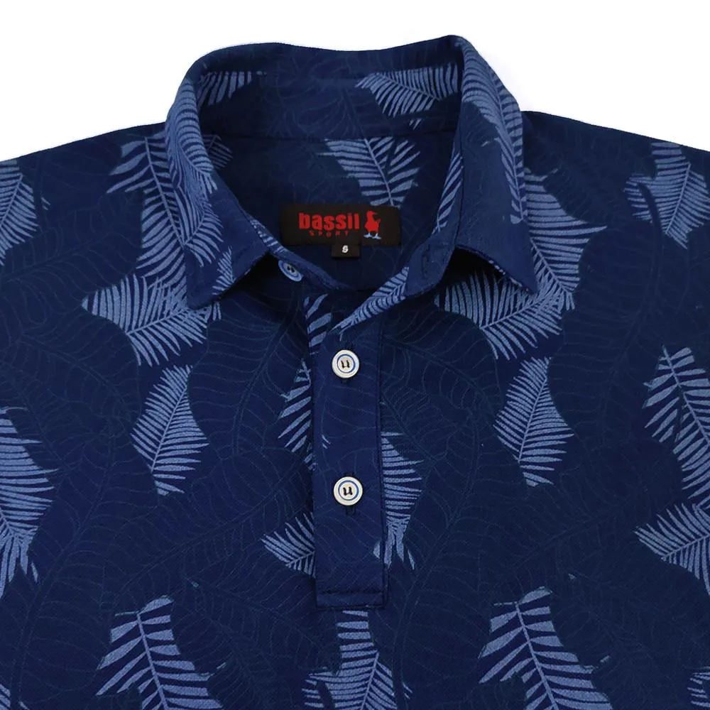 POLO AZUL CON ESTAMPADOS DE HOJAS