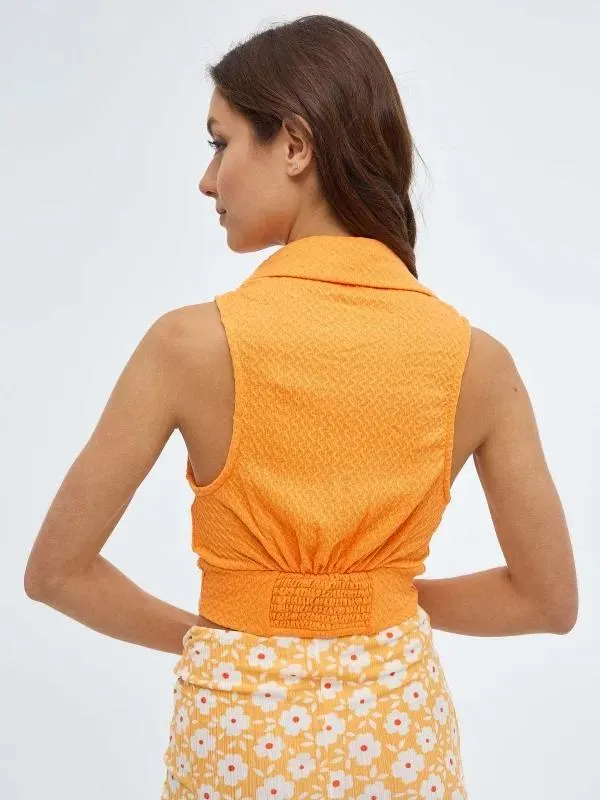 Camiseta cuello polo sin mangas