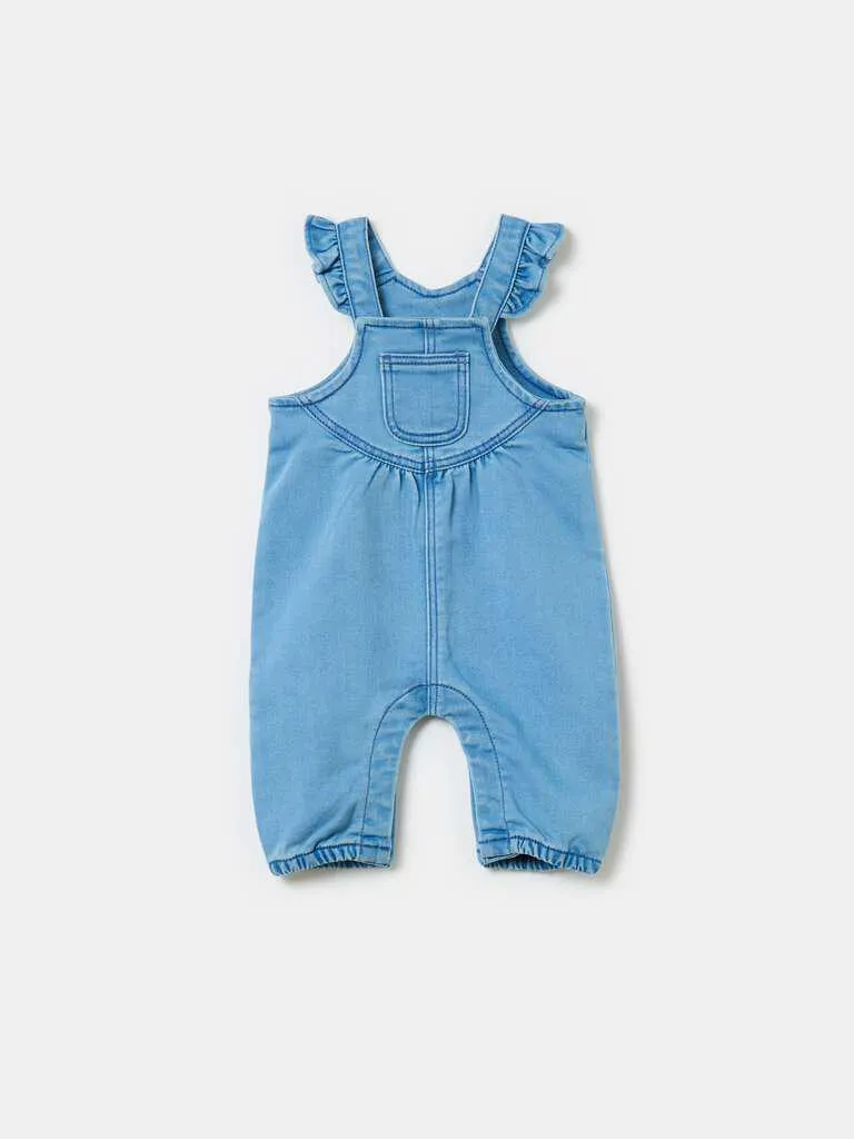 Denim dungarees with flounce Décoloration légère