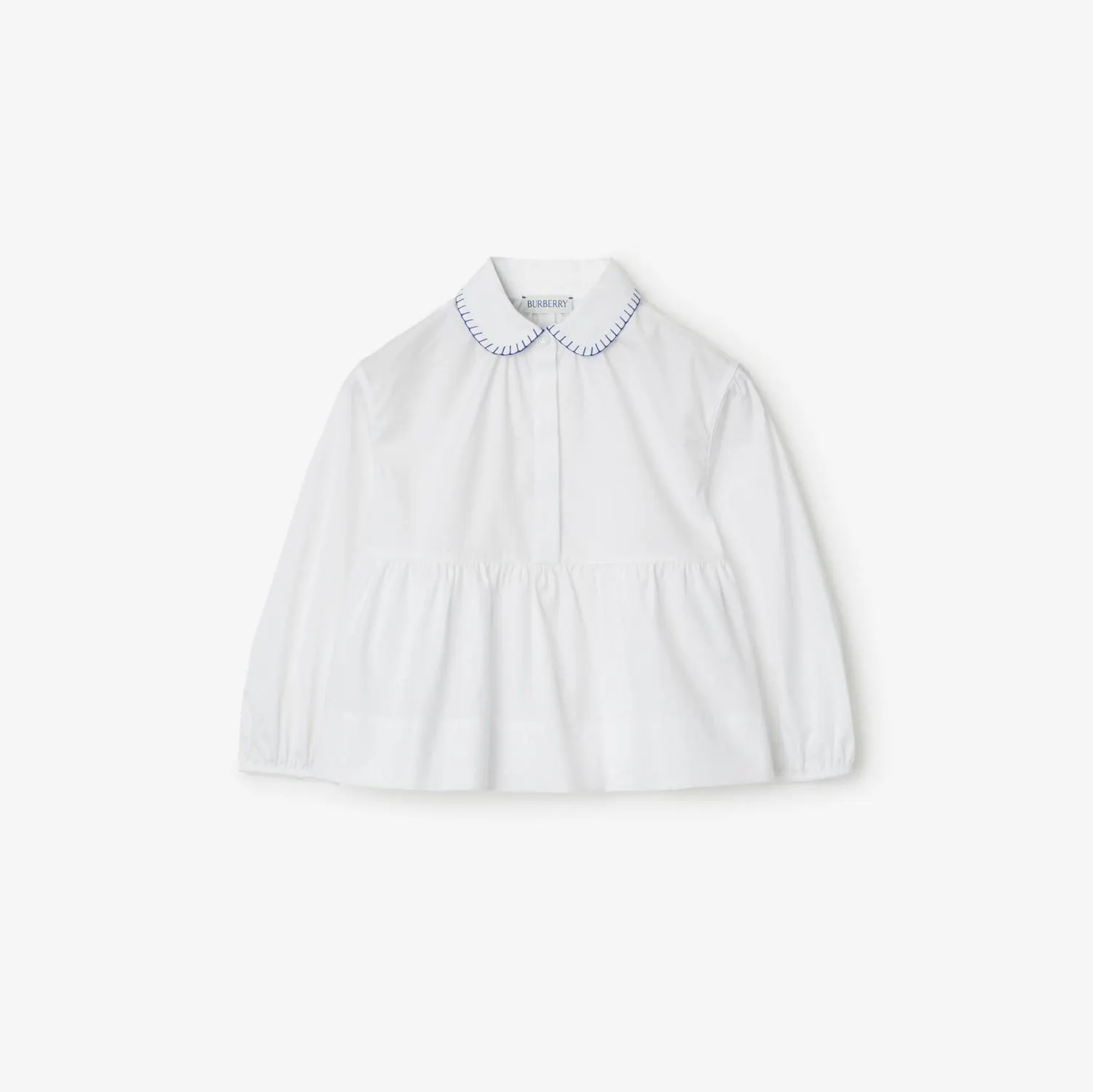 Blusa en algodón con sobrefalda