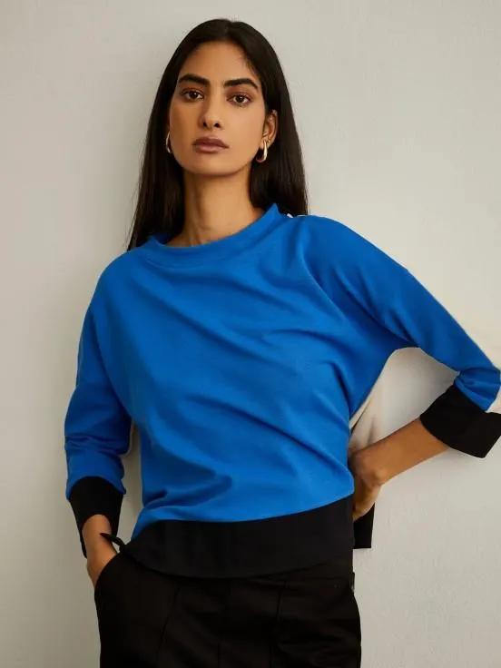 Jersey color block con medio cuello