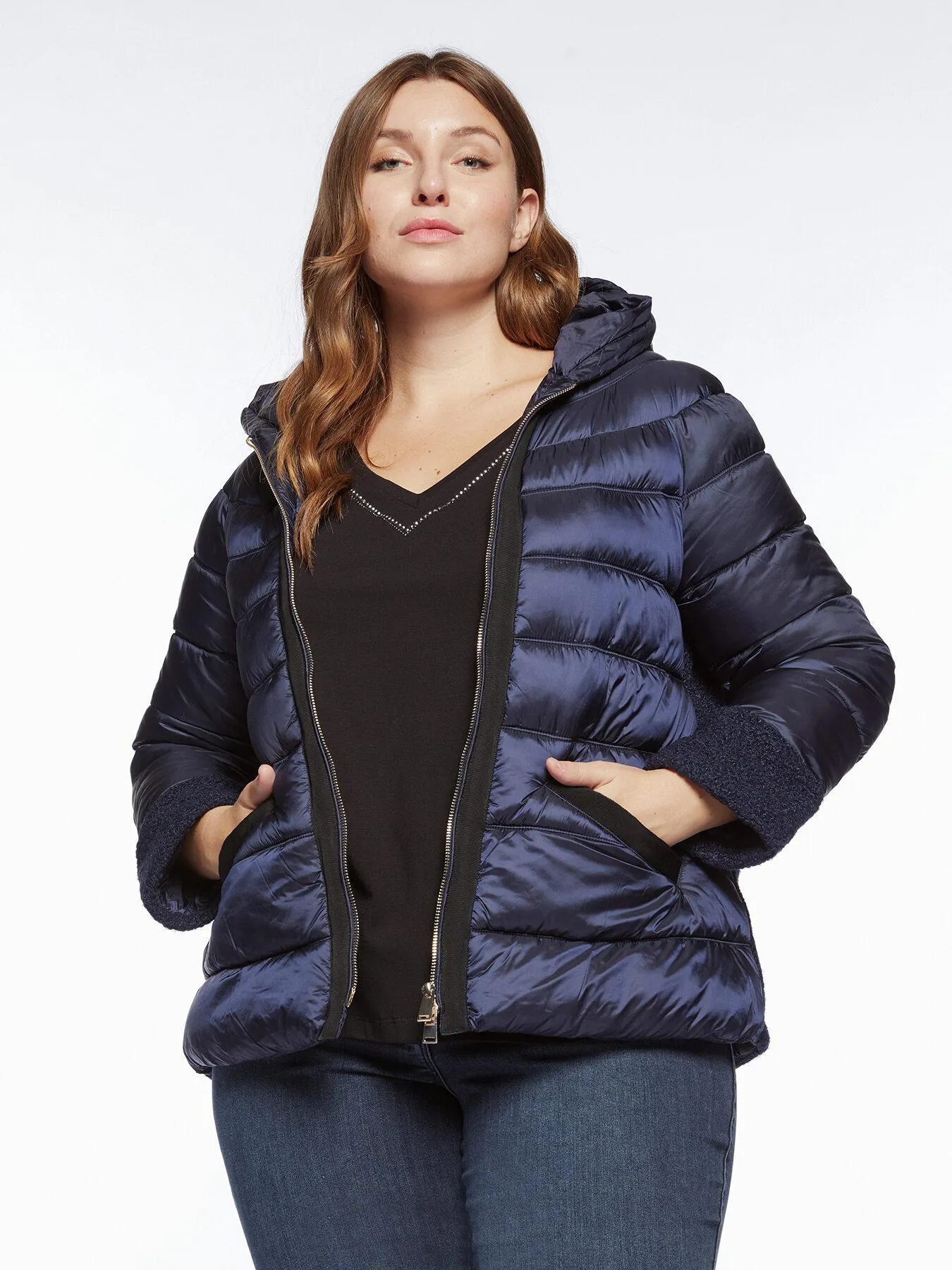 Plumífero con partes de tejido bouclé