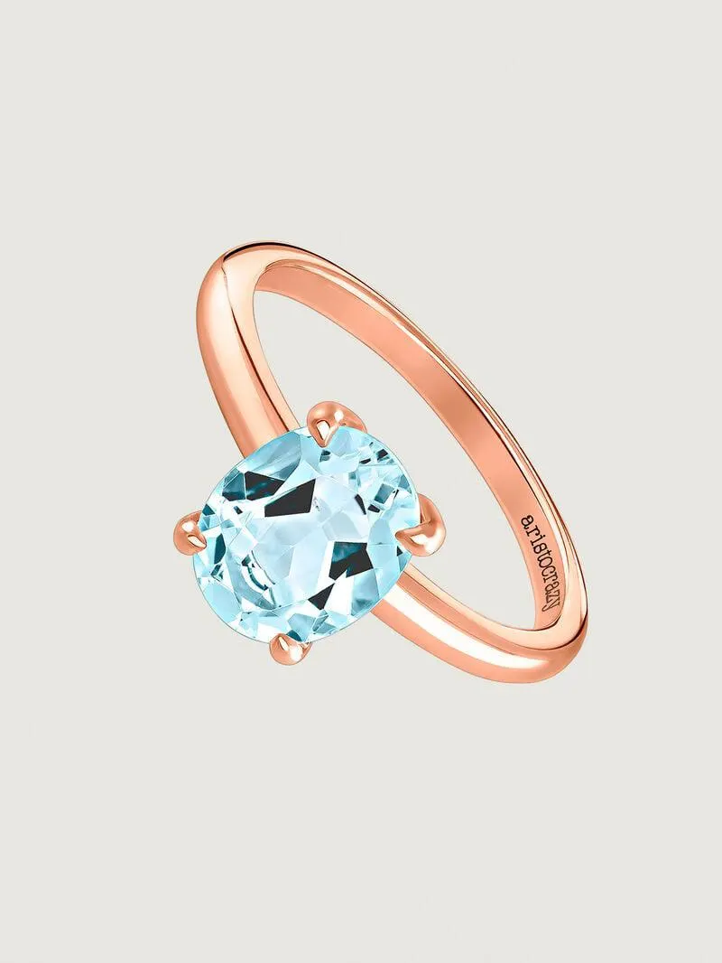 Pendientes medianos de aro de plata 925 bañada en oro rosa de 18K con topacio azul sky