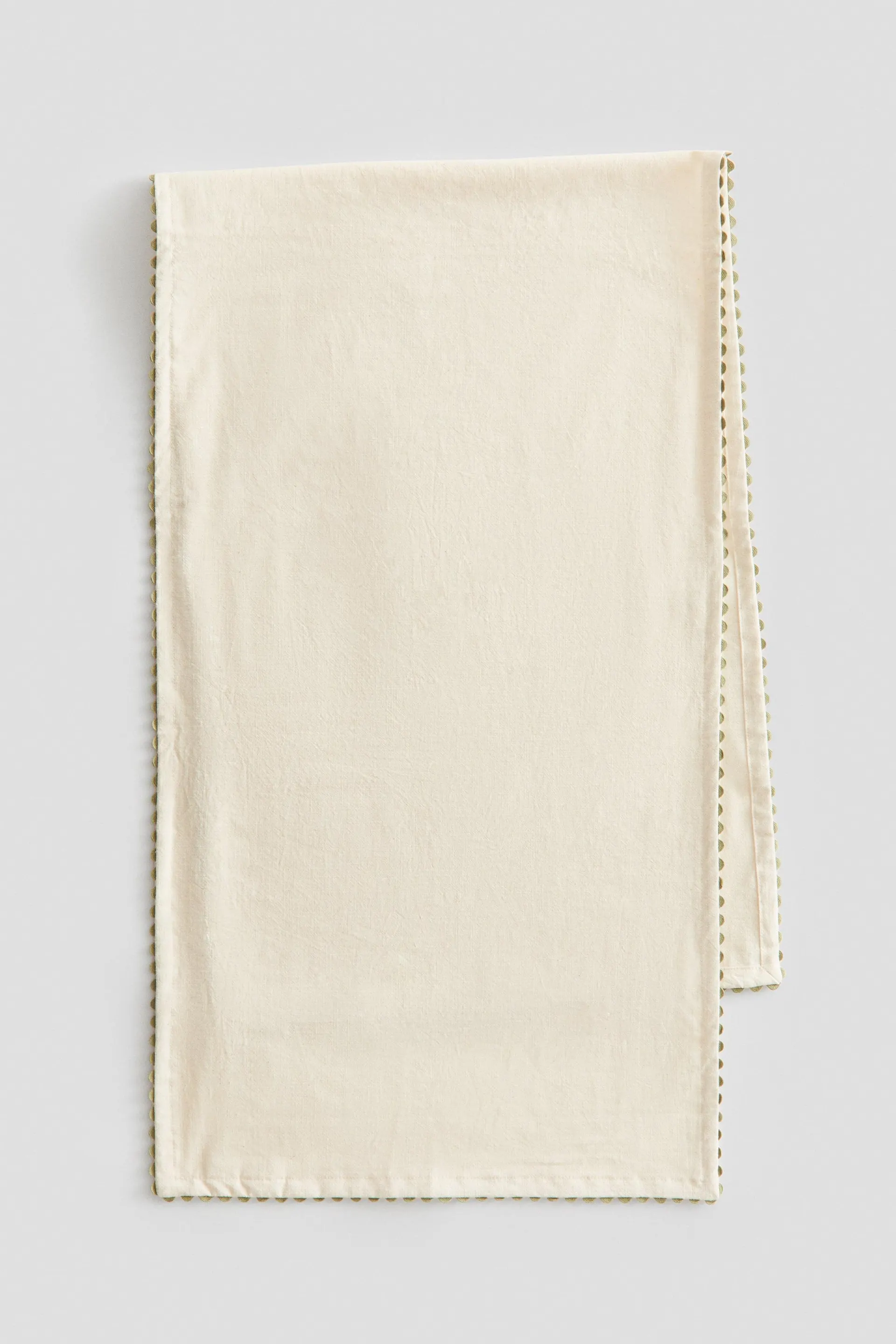 Corremesas con ribete festoneado