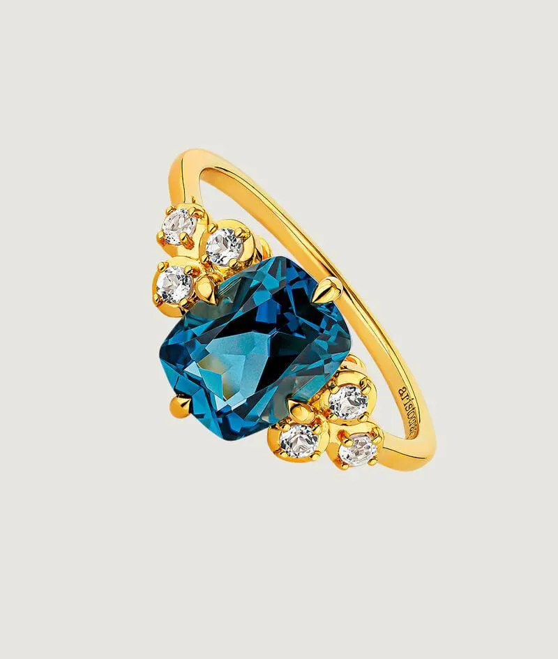 Anillo de plata 925 bañada en oro amarillo de 18K con topacios blancos y London Blue