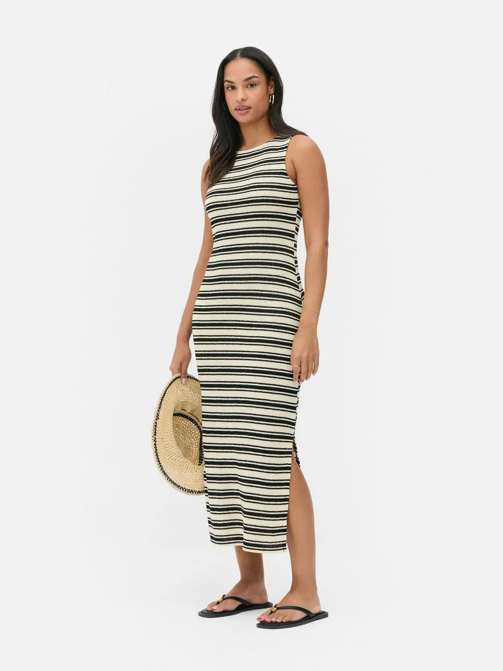 Vestido midi a rayas con abertura en el bajo