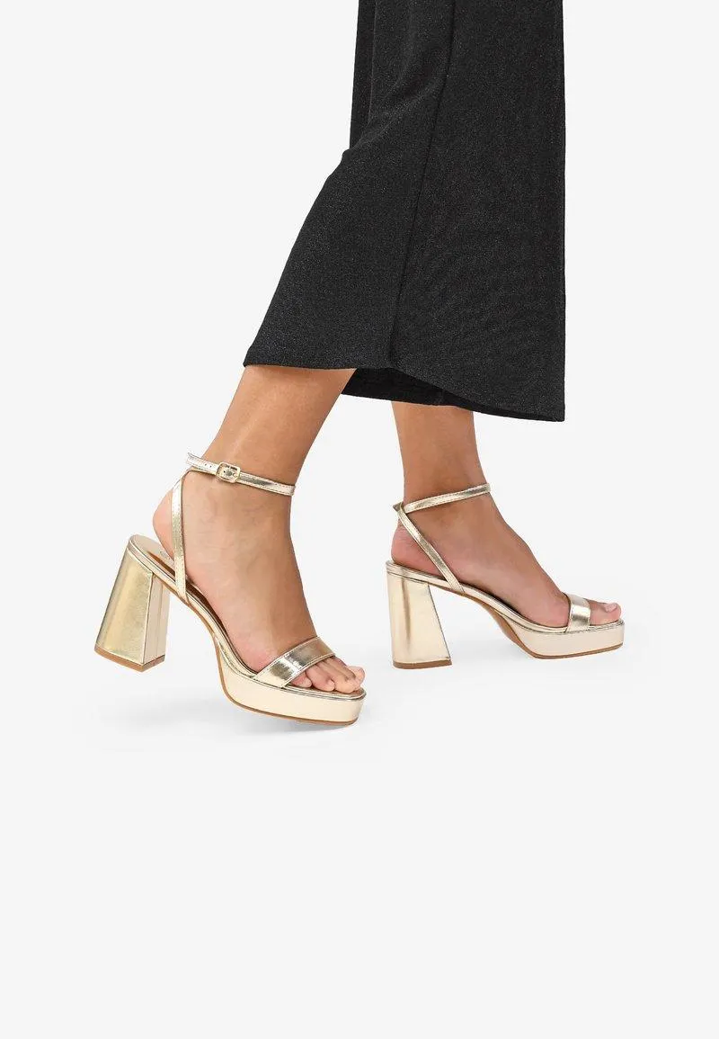 CON CAMPANA - Sandalias de tacón - oro