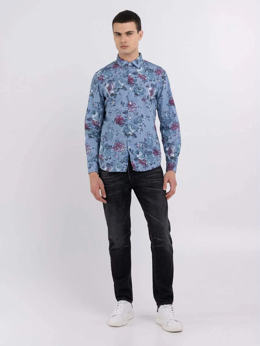 Camisa de popelín con estampado floral por toda la prenda