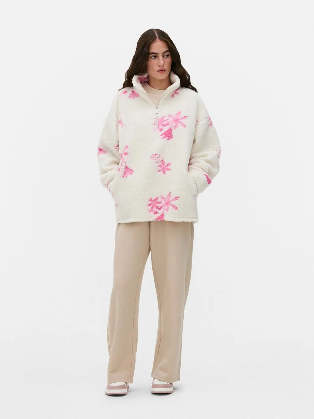 Forro polar de borreguito con media cremallera