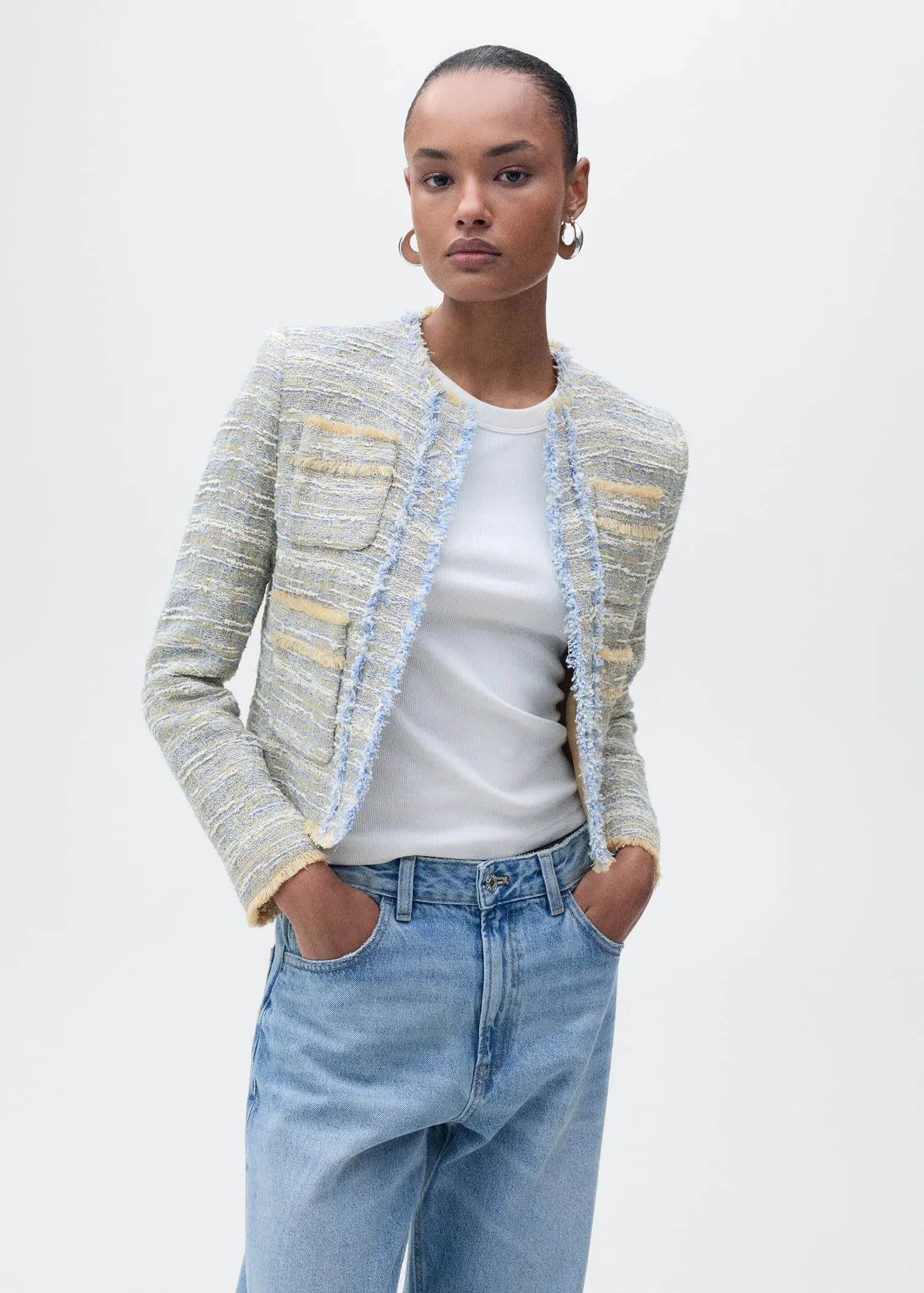 Chaqueta tweed terminaciones deshilachadas