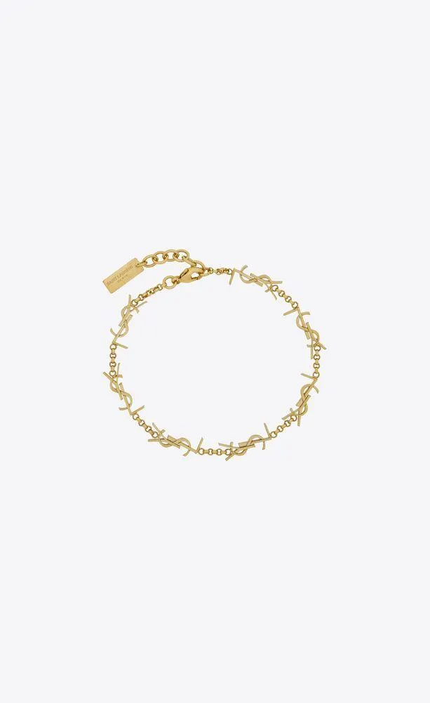 pulsera cassandre de metal con varios charms