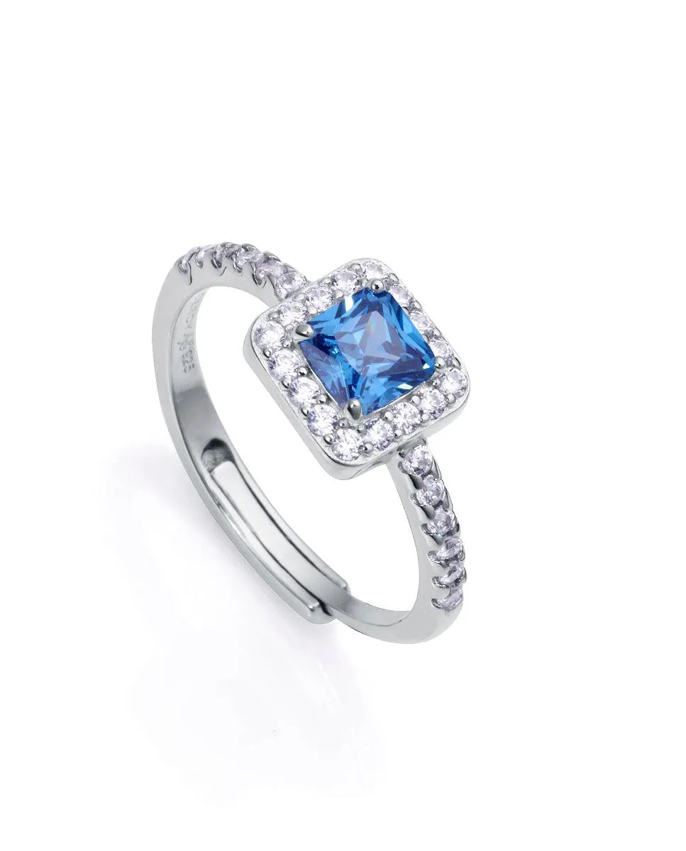 Anillo Clásica de plata de ley con baño de rodio , circonita azul y circonitas blancas