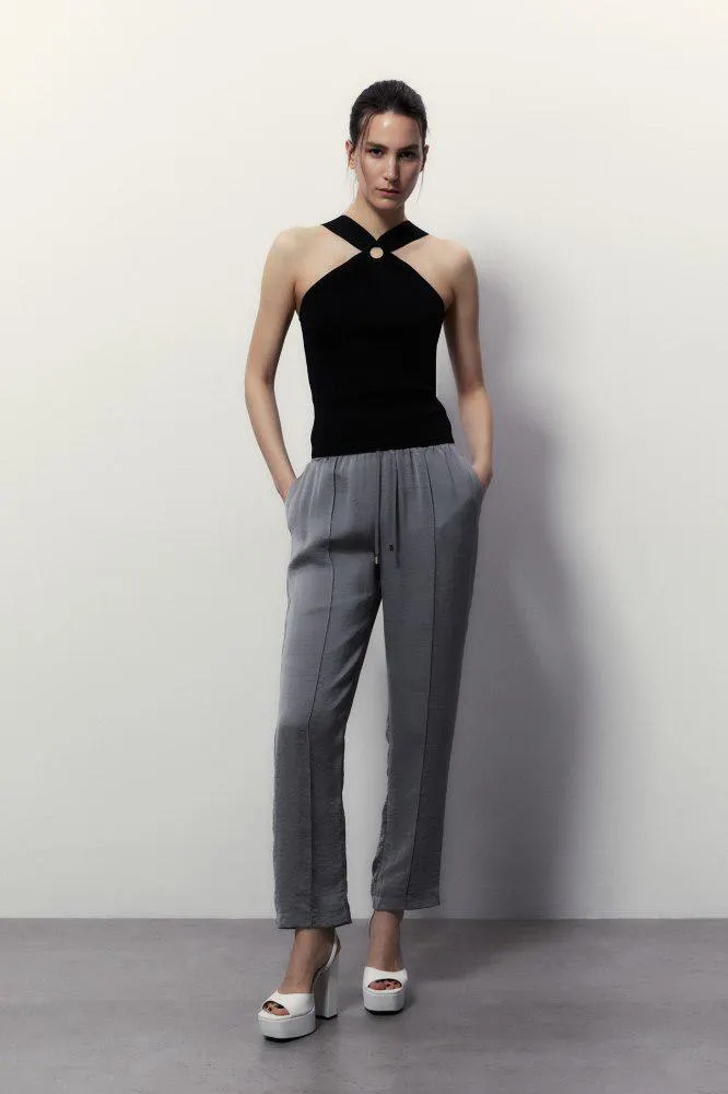 Pantalón fluido liso