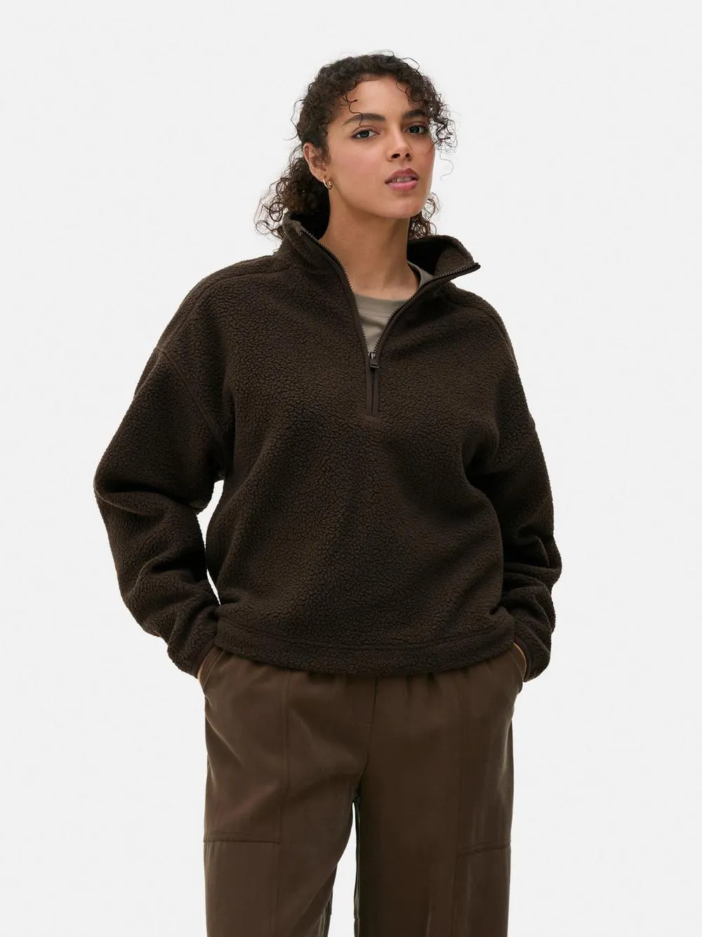 Forro polar de borreguito con media cremallera