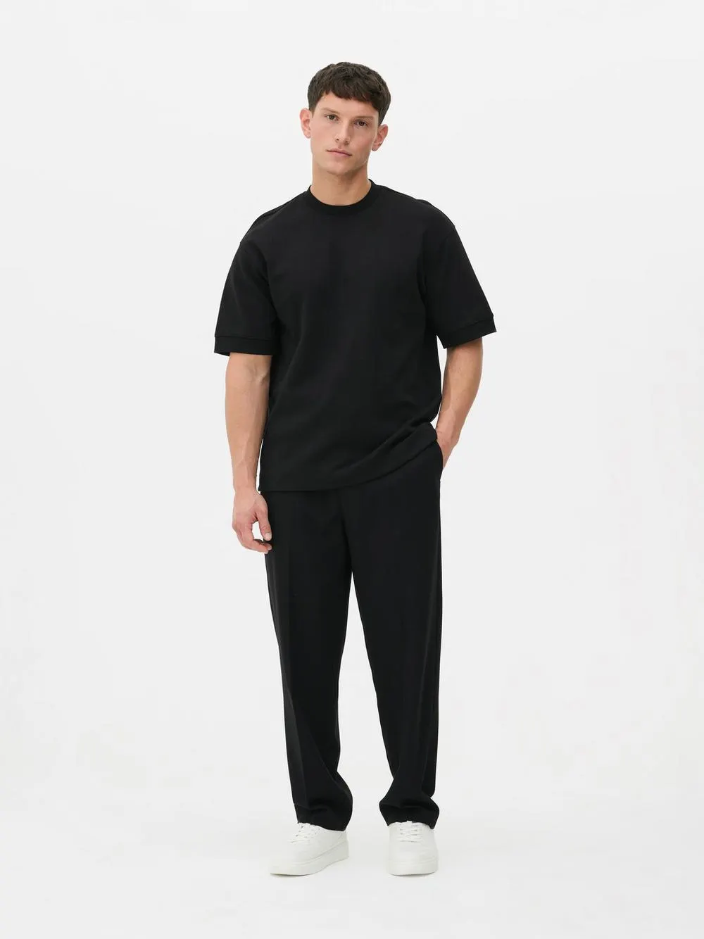 Camiseta con puños ajustados en las mangas de Kem