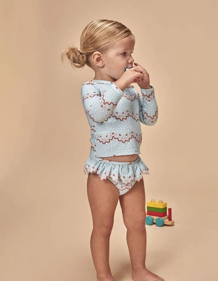 Culetín estampado ondas azul claro