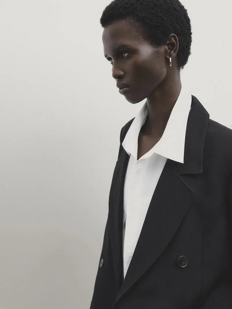 Americana corta negra cruzada