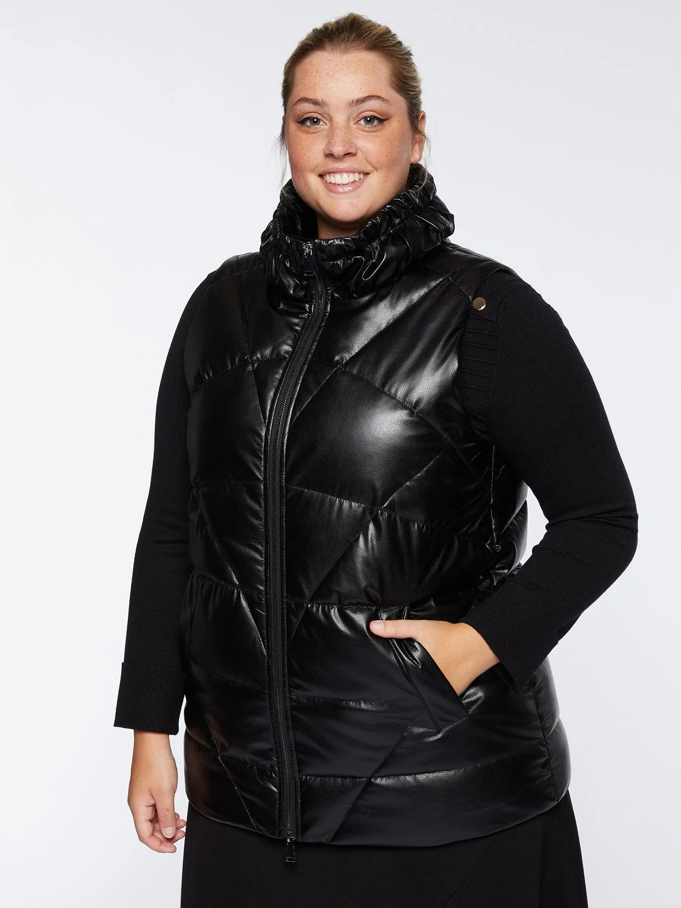 Plumífero sin mangas de piel sintética