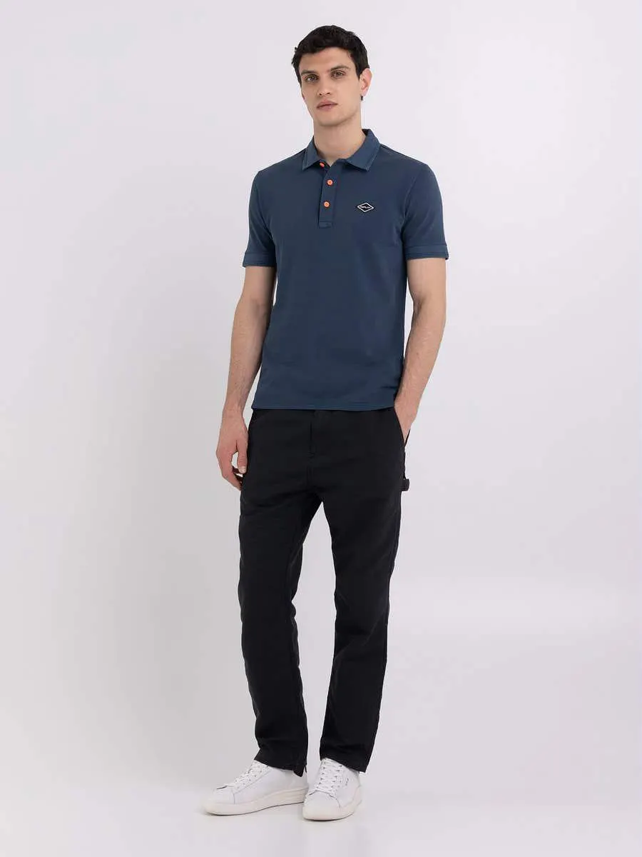 Polo de piqué con detalles en contraste