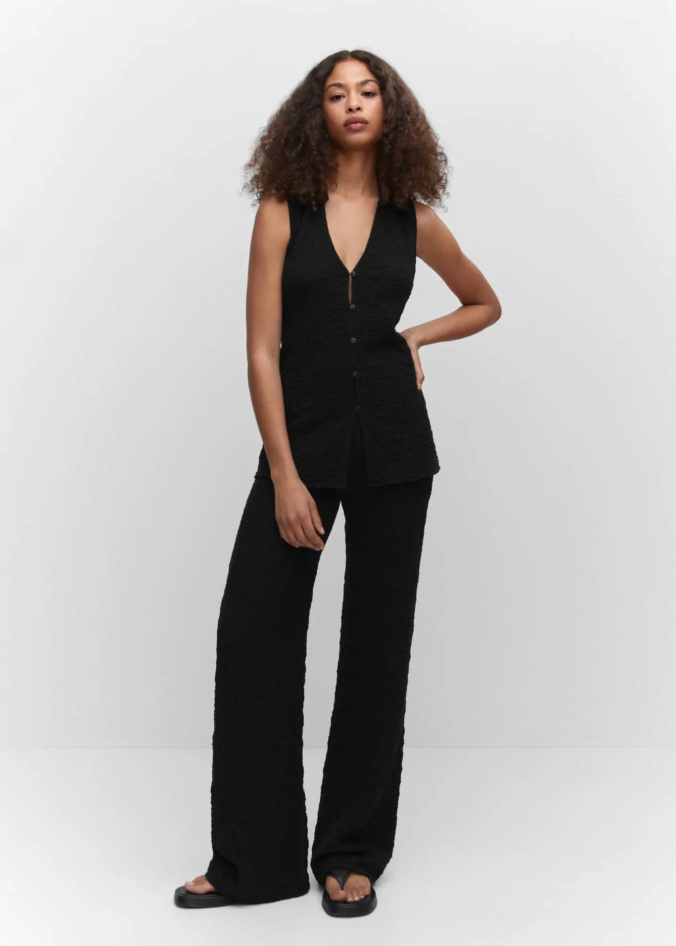 Chaleco textura cuello polo