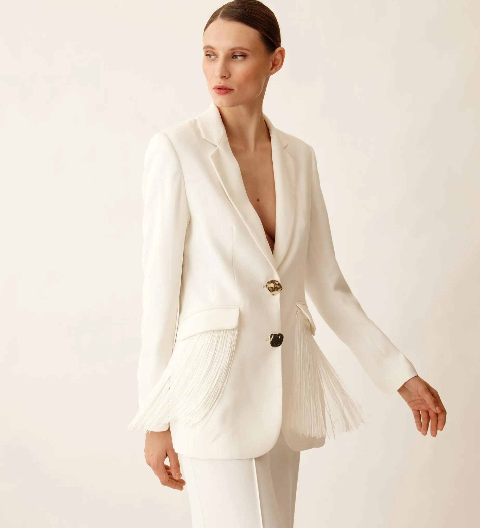 Americana con flecos