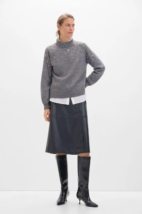 Conjunto de bota, jersey y falda