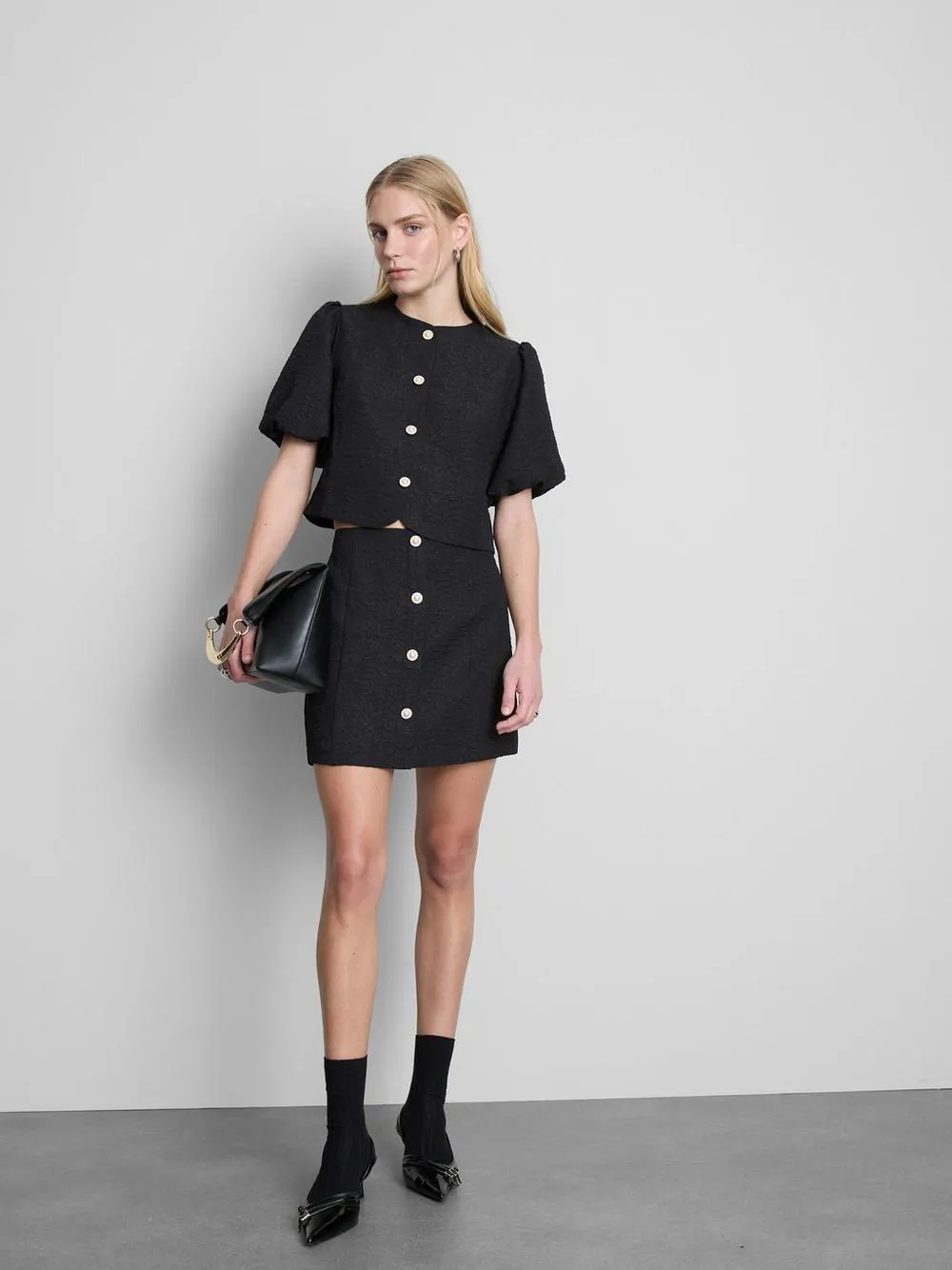 Camiseta corta con manga abombada texturizada