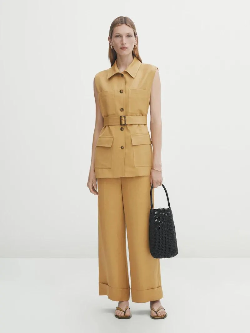 Chaleco traje cinturón cuatro bolsillos