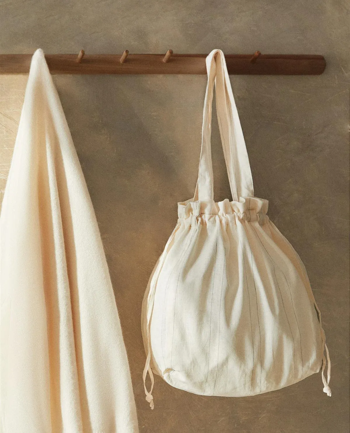 BOLSA COLADA VIAJE RAYAS