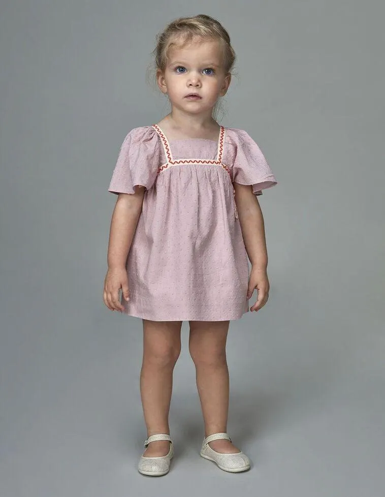 Vestido detalles flúor rosa