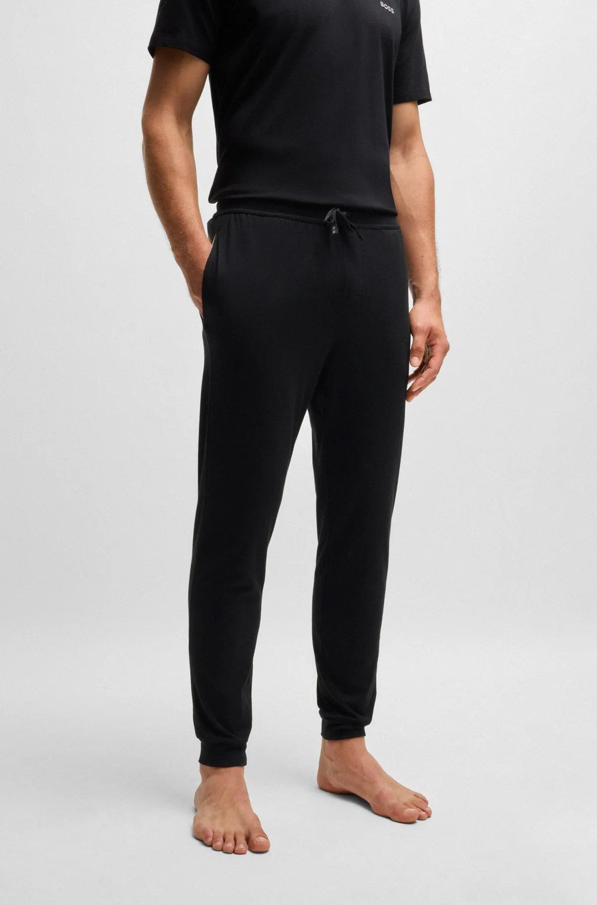 Pantalones de chándal de algodón elástico con logo bordado