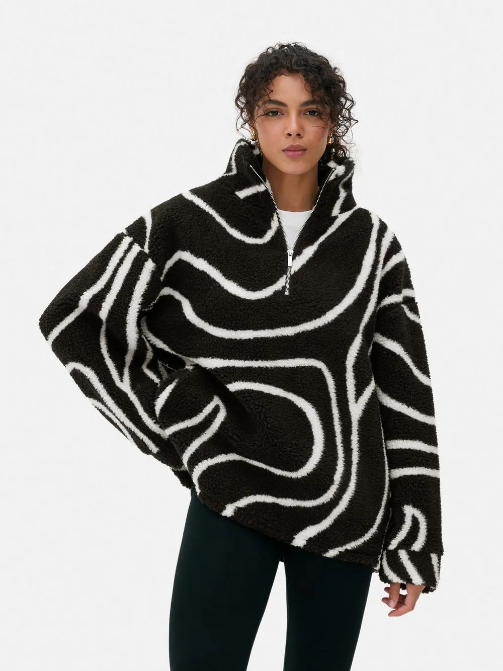 Forro polar de borreguito con media cremallera