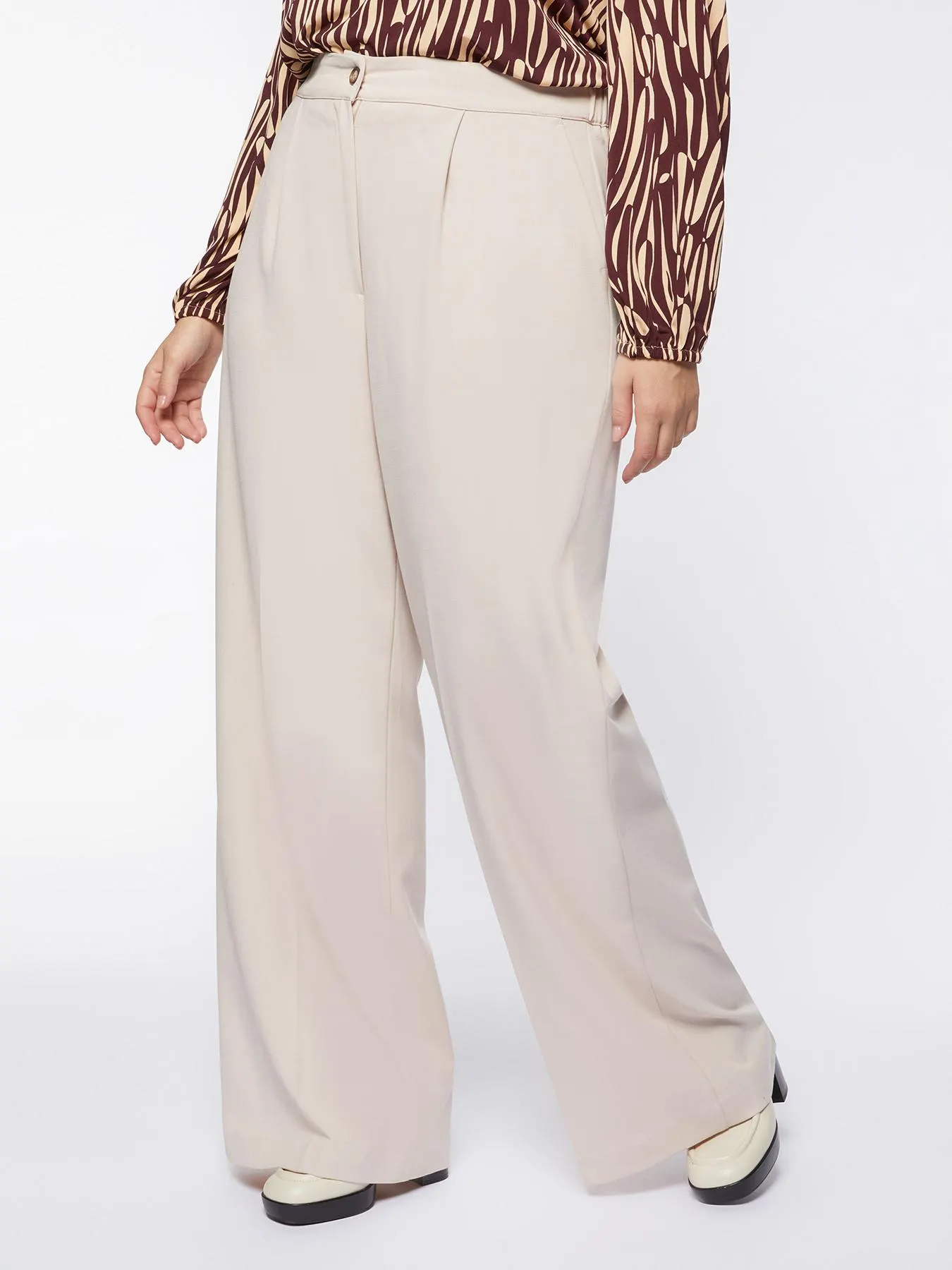 Pantalones palazzo con pliegues