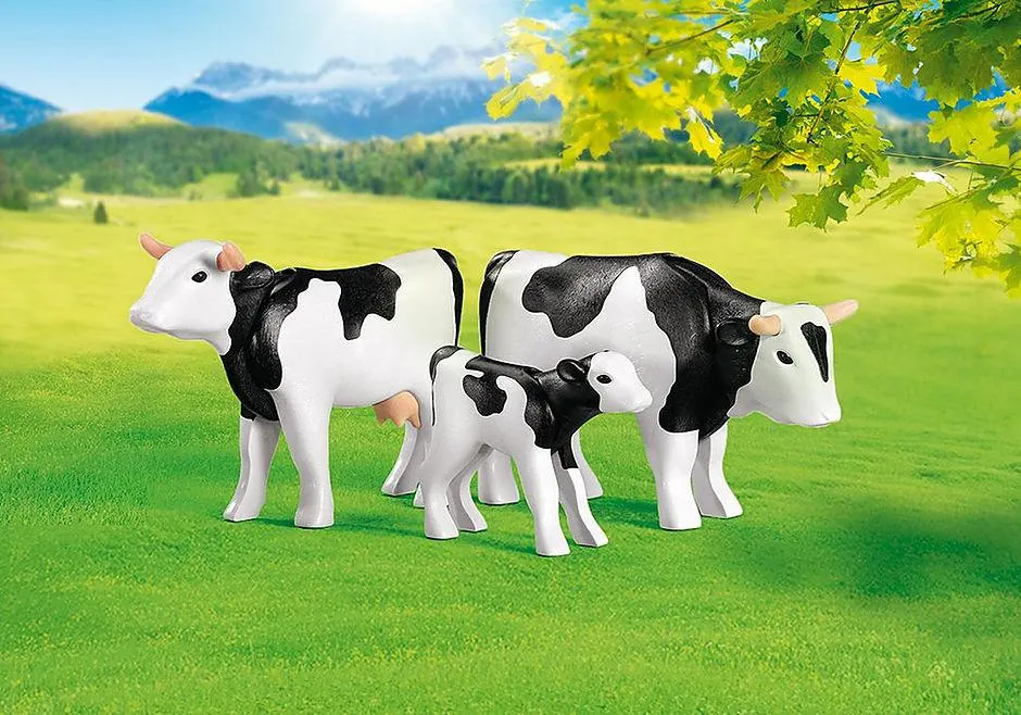 2 vaches avec veau noirs / blancs