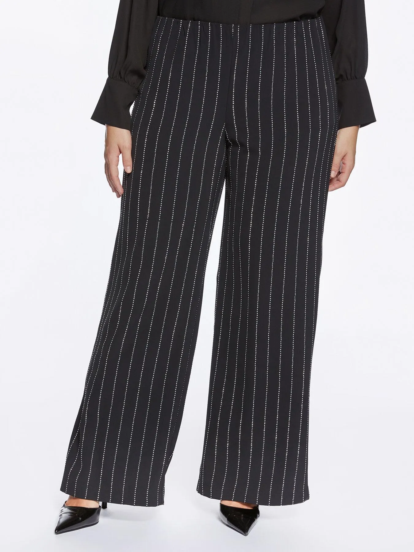 Pantaloni con gessatura in piccole borchie