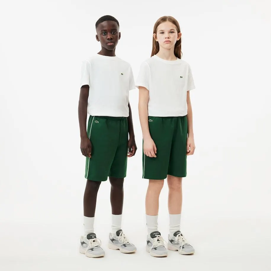 Pantalón corto en tejido interlock con motivo de rayas a contraste