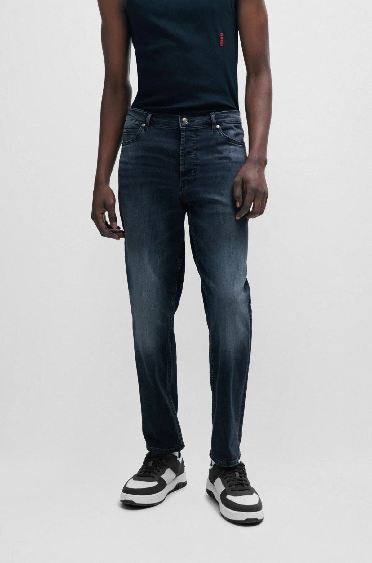 Vaqueros tapered fit de denim elástico azul