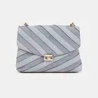 Bolso bandolera con detalles de ante