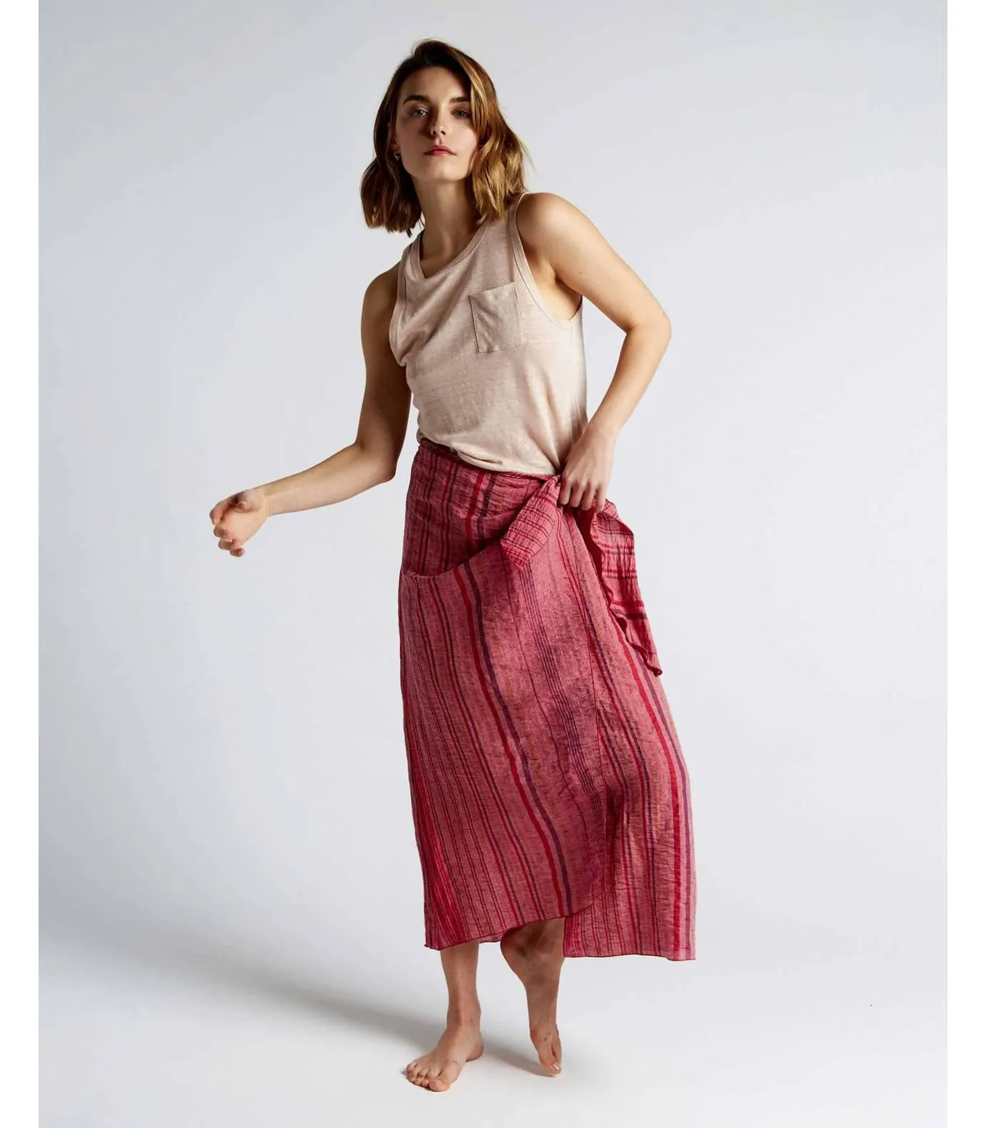 Pareo de tejido de rayas color fucsia